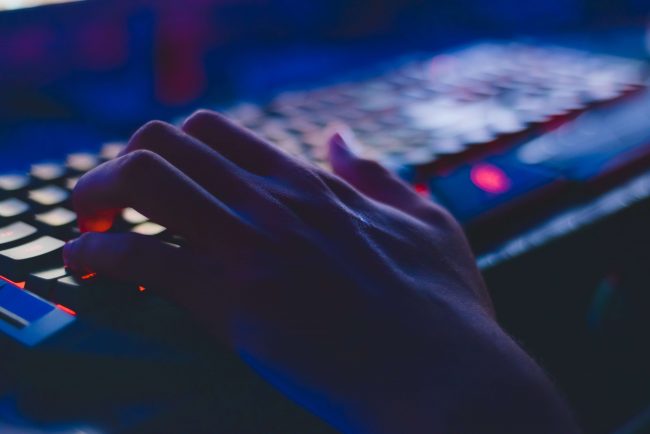picture of hands typing on a keyboard for cyber and data insurance by protect commercial