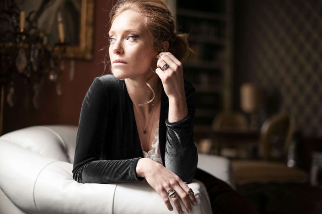 picture of a woman with jewellery on for high value household insurance by protect commercial